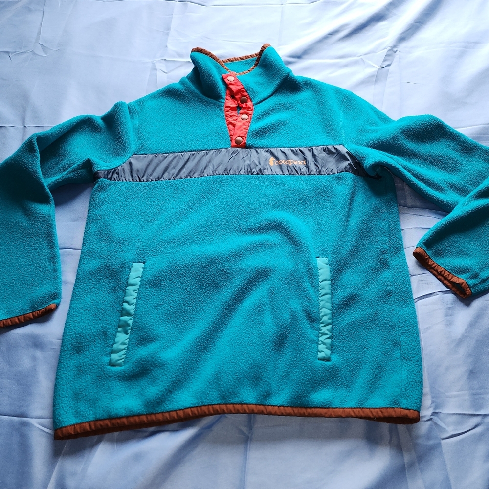 COTOPAXI MEN'S TACA FLEECE PULLOVER SWEATER BLUE/BROWN/RED SIZE MEDIUM IS USED